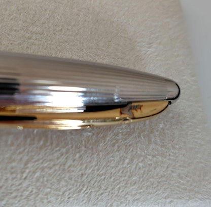 Waterman ballpoint pen with company name marking, unused with slight discoloration on clip