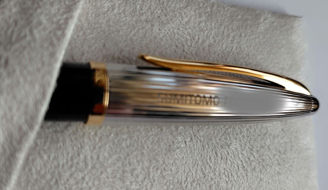 Waterman ballpoint pen with company name marking, unused with slight discoloration on clip