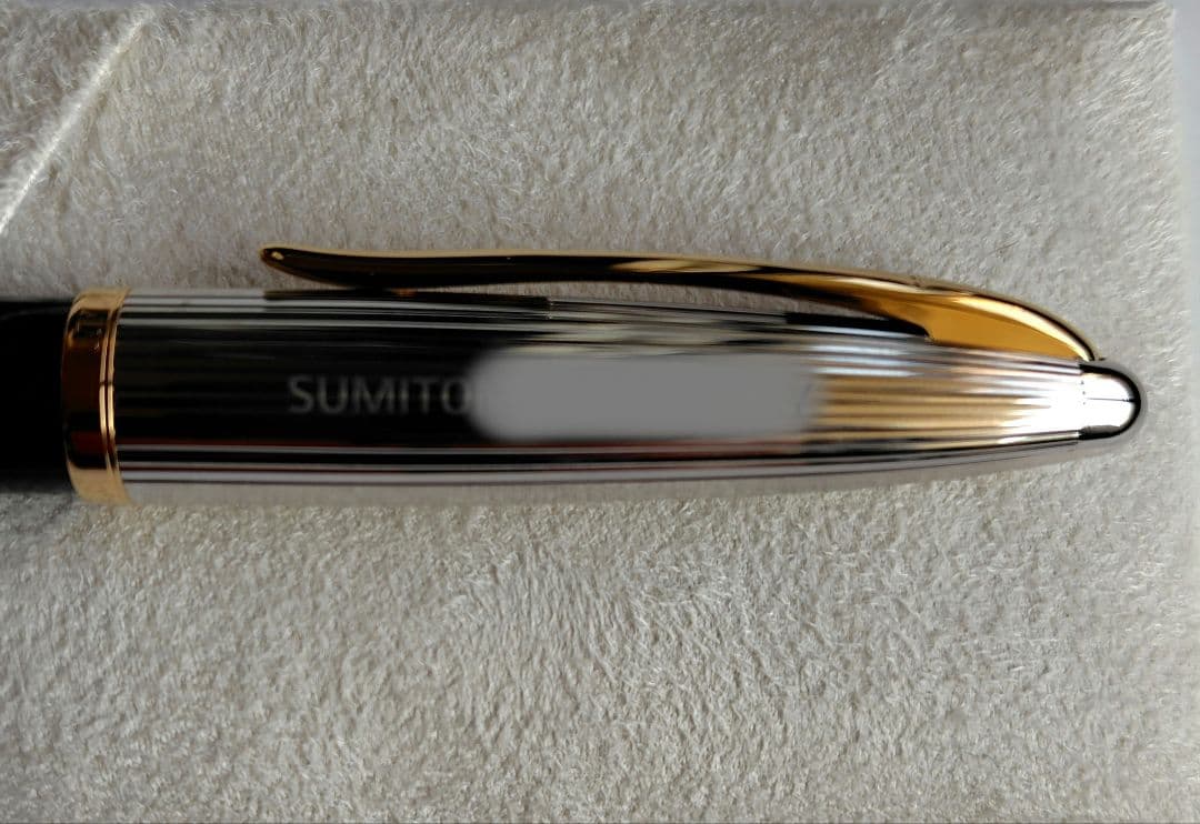 Waterman ballpoint pen with company name marking, unused with slight discoloration on clip