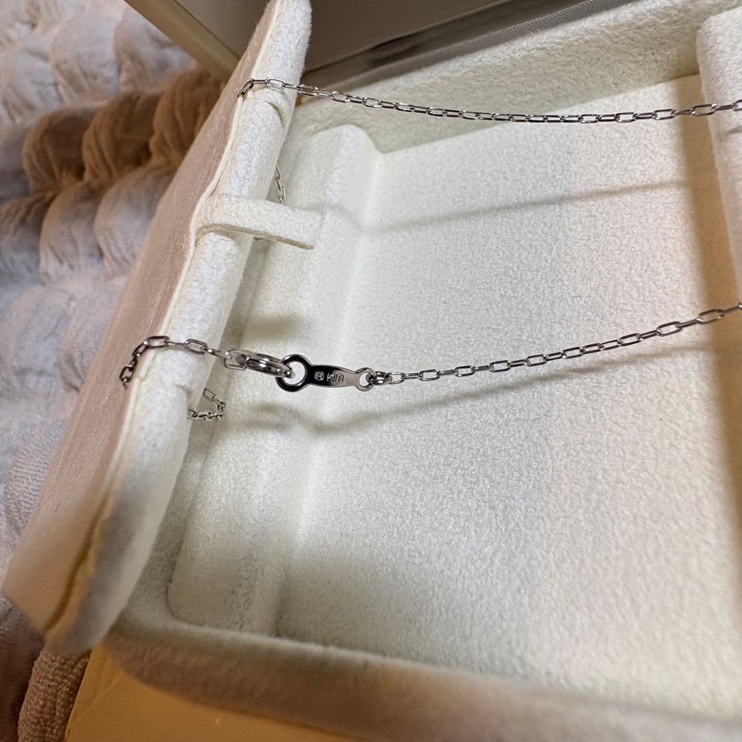 Mikimoto K18 white gold Akoya pearl necklace featuring 5.25mm pearls and small diamond accents, 40cm adjustable length