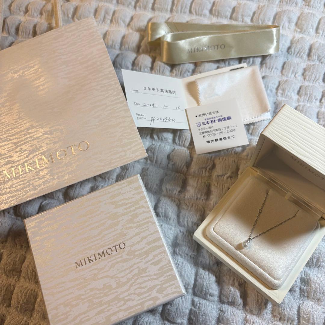 Mikimoto K18 white gold Akoya pearl necklace featuring 5.25mm pearls and small diamond accents, 40cm adjustable length