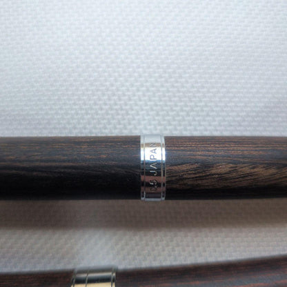 Pilot Legno set with two multifunctional ballpoint pens and one 0.5mm mechanical pencil showing black wooden design