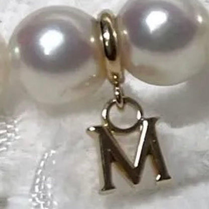 Mikimoto K14 Akoya pearl necklace with 6.5-7.0mm pearls and M charm on 38cm chain