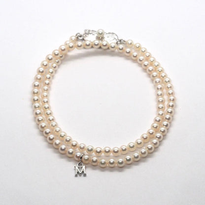 MIKIMOTO Baby Pearl Necklace with 98 small pearls and silver clasp, 37.5 cm length