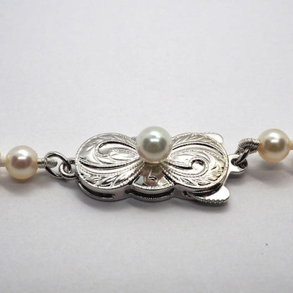 MIKIMOTO Baby Pearl Necklace with 98 small pearls and silver clasp, 37.5 cm length