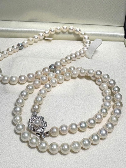 Iridescent Akoya pearl funeral set with two-piece necklace and bunch of prayer beads featuring silver clasp