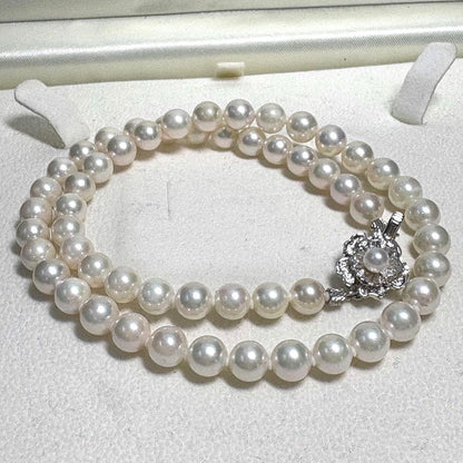 Iridescent Akoya pearl funeral set with two-piece necklace and bunch of prayer beads featuring silver clasp