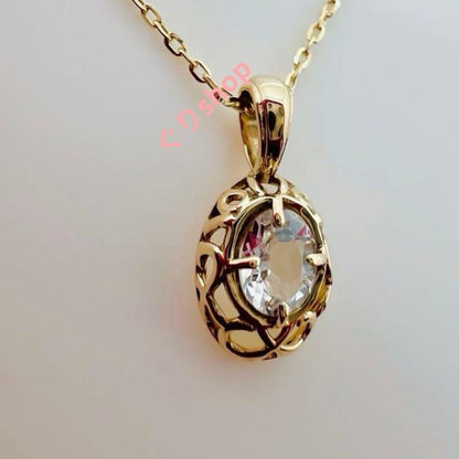 Agete K10 YG11 necklace with a 7.7mm by 5.7mm topaz gemstone on a 40cm gold chain
