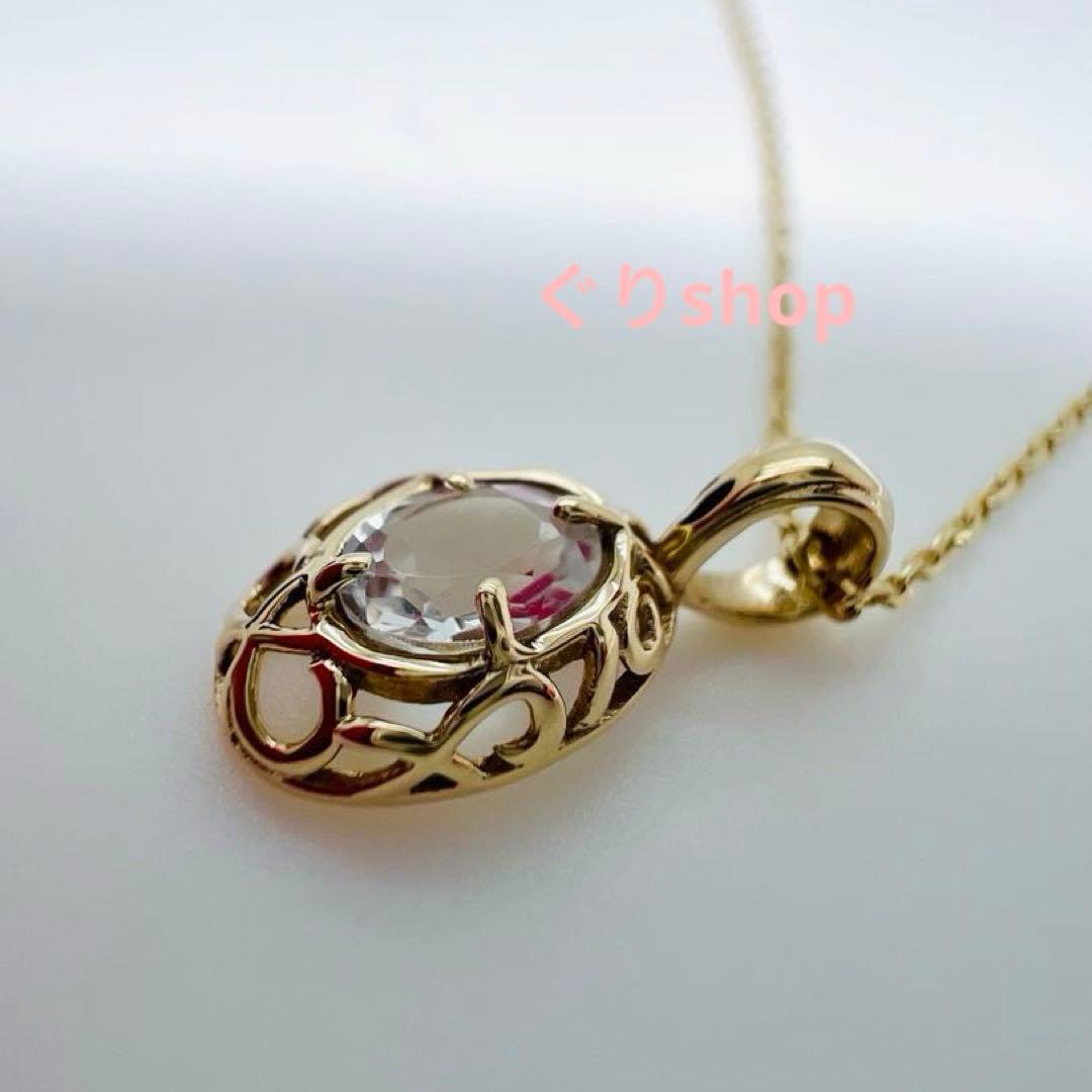 Agete K10 YG11 necklace with a 7.7mm by 5.7mm topaz gemstone on a 40cm gold chain