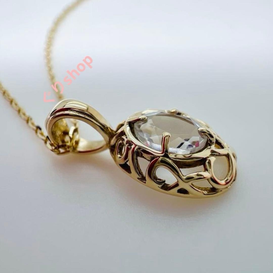 Agete K10 YG11 necklace with a 7.7mm by 5.7mm topaz gemstone on a 40cm gold chain