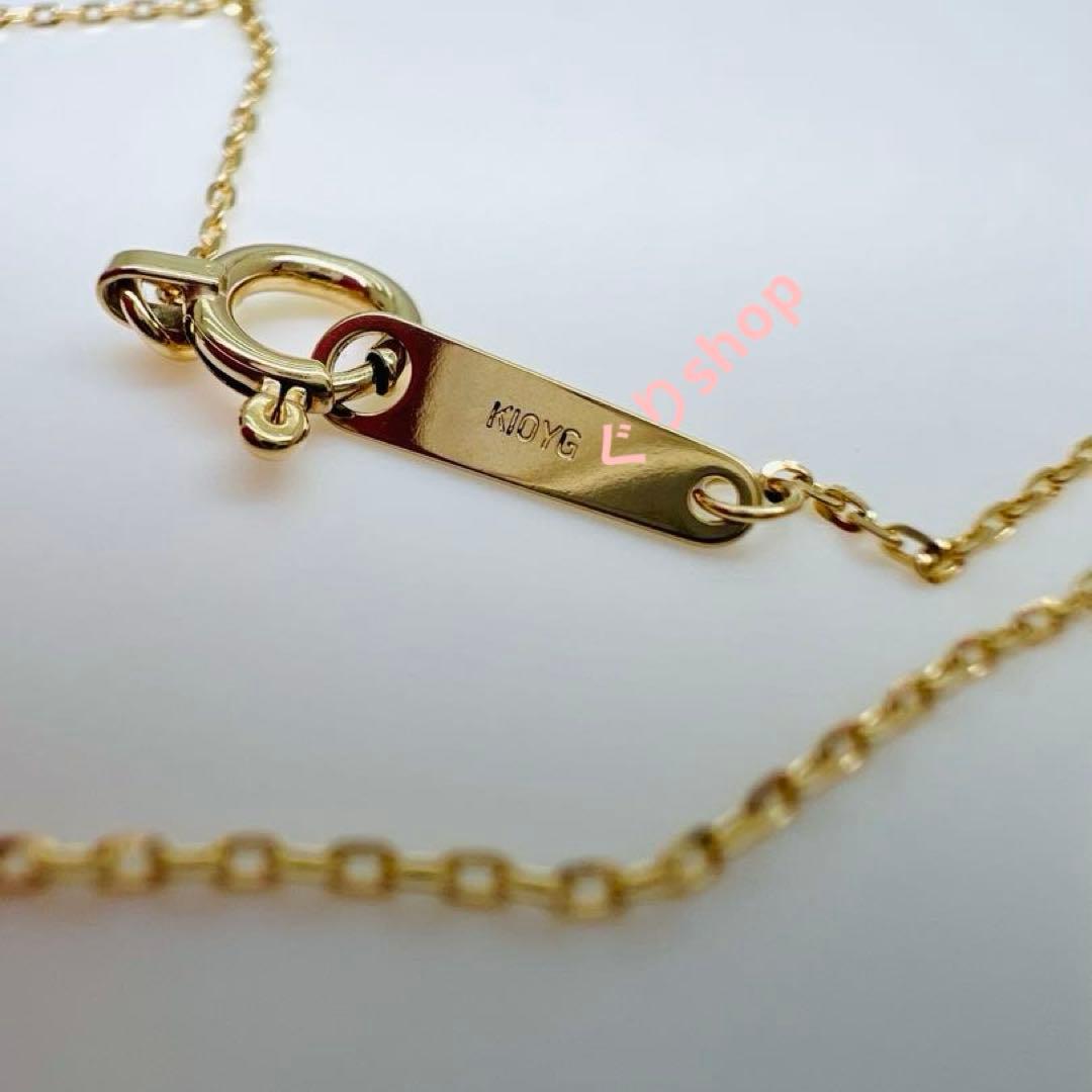 Agete K10 YG11 necklace with a 7.7mm by 5.7mm topaz gemstone on a 40cm gold chain