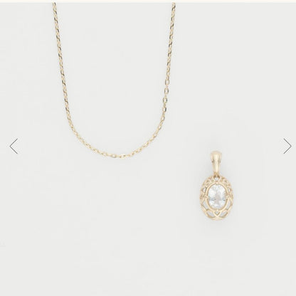 Agete K10 YG11 necklace with a 7.7mm by 5.7mm topaz gemstone on a 40cm gold chain
