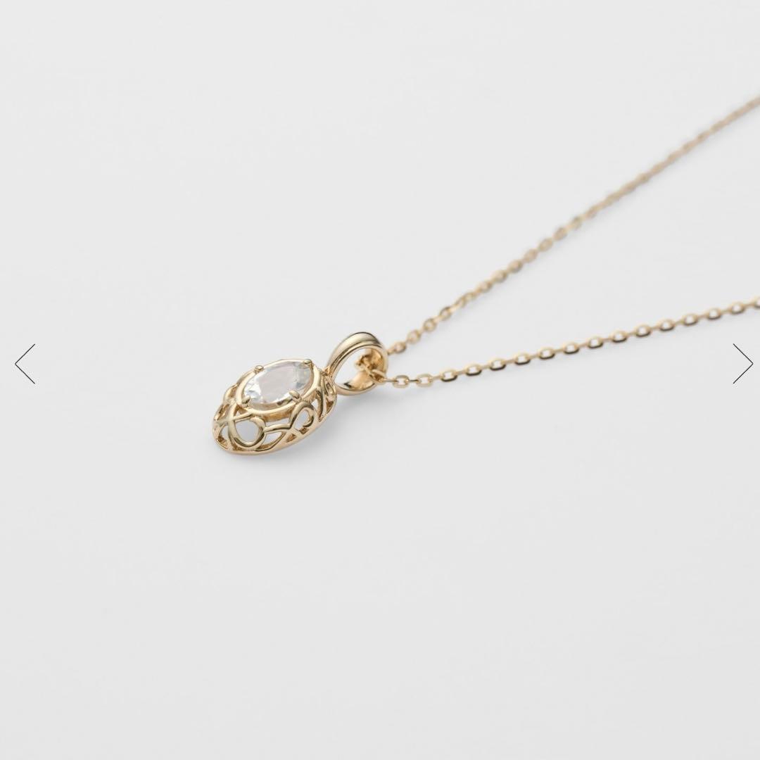 Agete K10 YG11 necklace with a 7.7mm by 5.7mm topaz gemstone on a 40cm gold chain