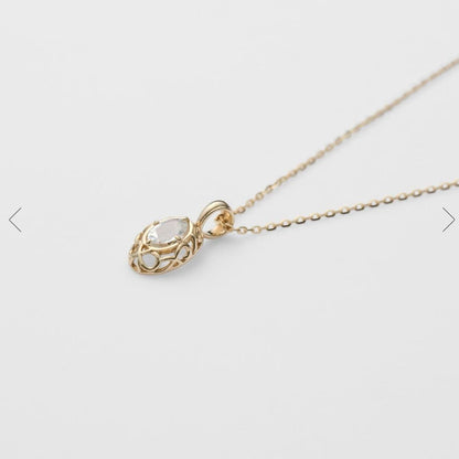 Agete K10 YG11 necklace with a 7.7mm by 5.7mm topaz gemstone on a 40cm gold chain