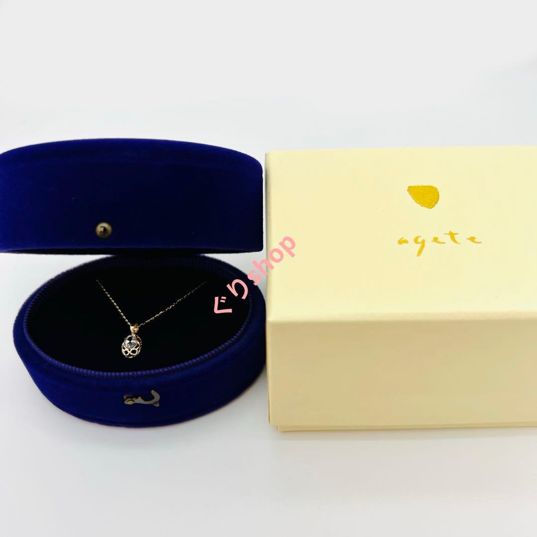 Agete K10 YG11 necklace with a 7.7mm by 5.7mm topaz gemstone on a 40cm gold chain