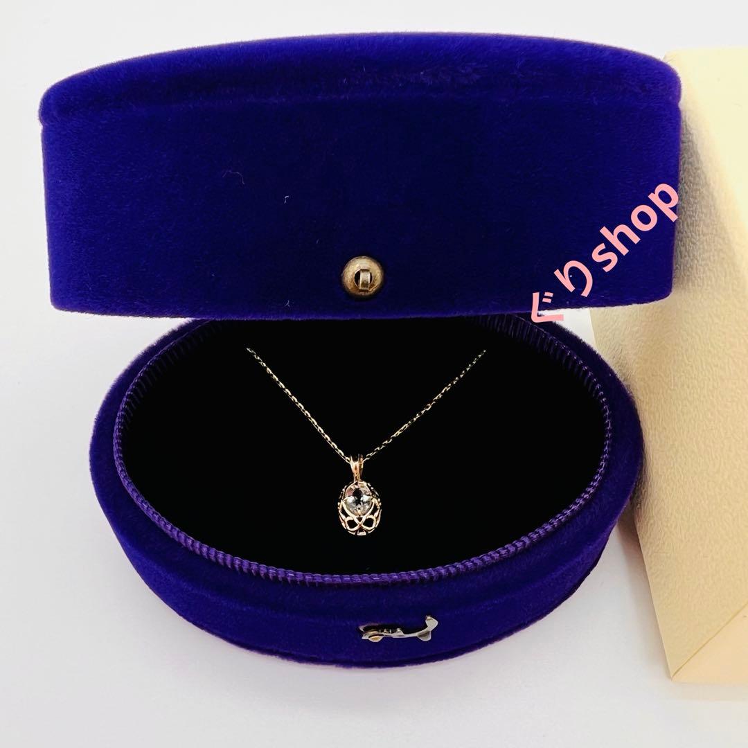 Agete K10 YG11 necklace with a 7.7mm by 5.7mm topaz gemstone on a 40cm gold chain