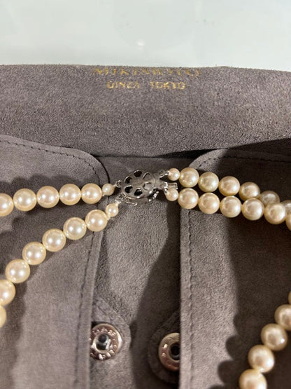 Mikimoto two-row pearl necklace featuring 6mm freshwater pearls with 42cm length, displayed on a white background