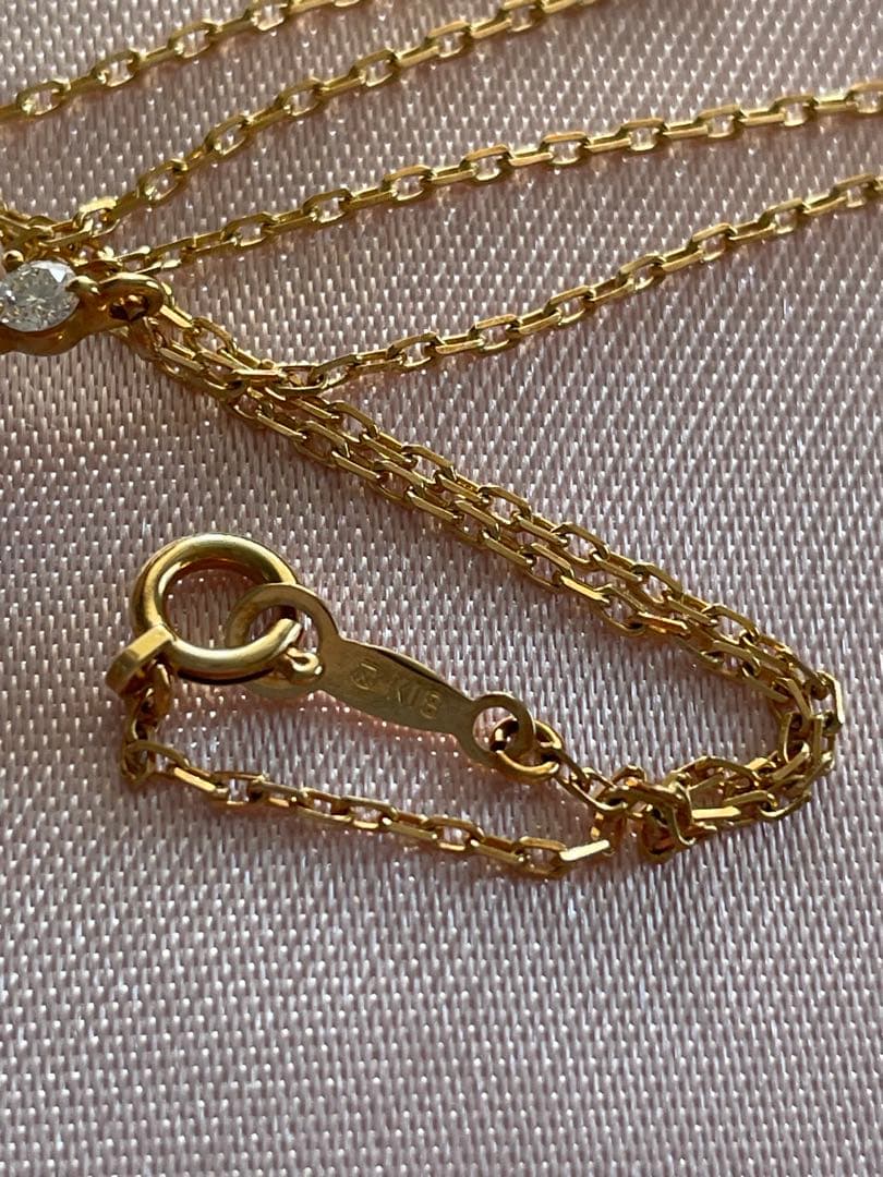 Mikimoto K18 Akoya pearl necklace with 7.4mm pearls and 37cm gold chain displayed on white background