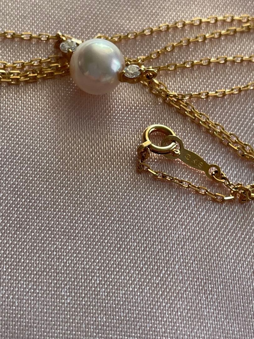 Mikimoto K18 Akoya pearl necklace with 7.4mm pearls and 37cm gold chain displayed on white background
