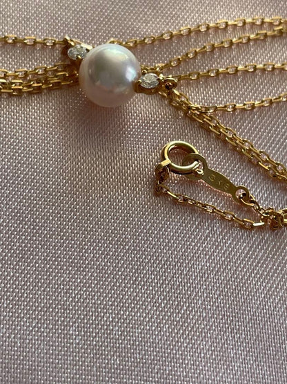 Mikimoto K18 Akoya pearl necklace with 7.4mm pearls and 37cm gold chain displayed on white background