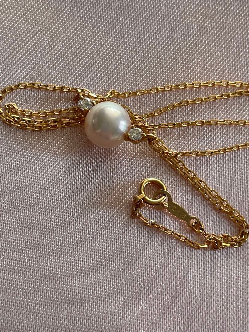 Mikimoto K18 Akoya pearl necklace with 7.4mm pearls and 37cm gold chain displayed on white background