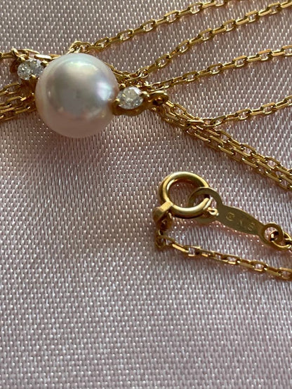 Mikimoto K18 Akoya pearl necklace with 7.4mm pearls and 37cm gold chain displayed on white background