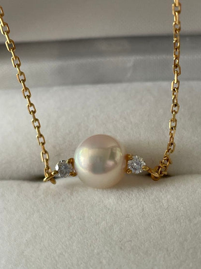 Mikimoto K18 Akoya pearl necklace with 7.4mm pearls and 37cm gold chain displayed on white background
