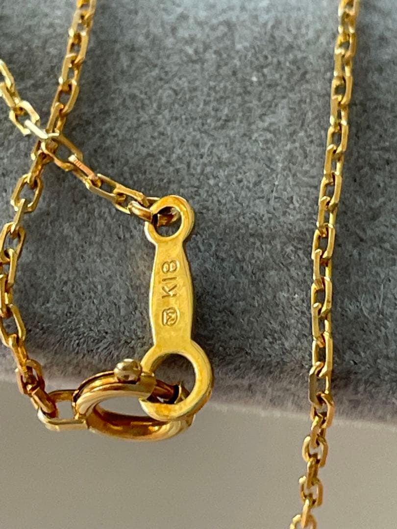 Mikimoto K18 Akoya pearl necklace with 7.4mm pearls and 37cm gold chain displayed on white background