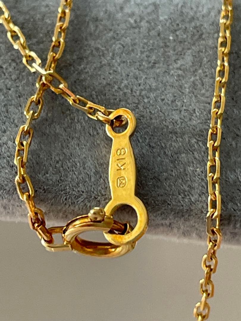 Mikimoto K18 Akoya pearl necklace with 7.4mm pearls and 37cm gold chain displayed on white background