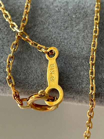 Mikimoto K18 Akoya pearl necklace with 7.4mm pearls and 37cm gold chain displayed on white background