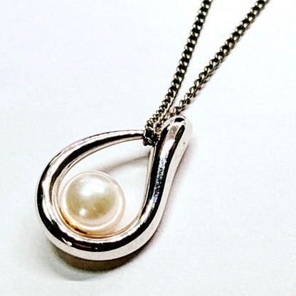 Tasaki pearl necklace with teardrop shaped pendant on a 42 cm sterling silver chain