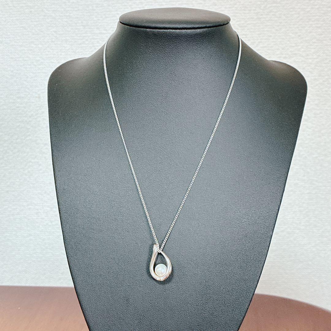 Tasaki pearl necklace with teardrop shaped pendant on a 42 cm sterling silver chain