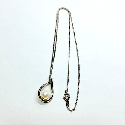 Tasaki pearl necklace with teardrop shaped pendant on a 42 cm sterling silver chain