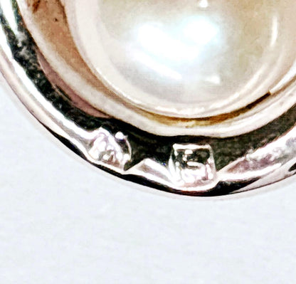 Tasaki pearl necklace with teardrop shaped pendant on a 42 cm sterling silver chain