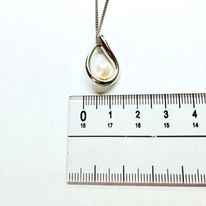 Tasaki pearl necklace with teardrop shaped pendant on a 42 cm sterling silver chain