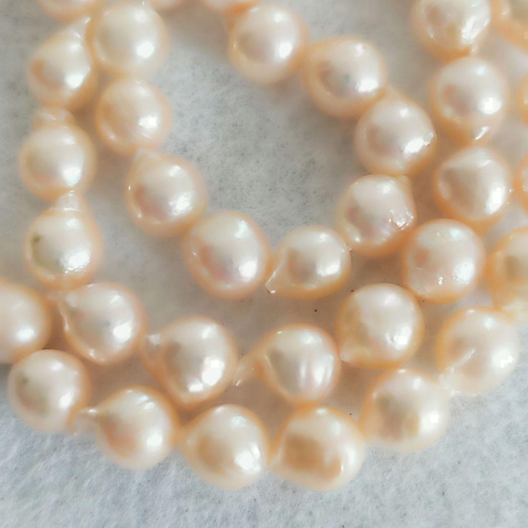 Akoya baroque pearl necklace in white with silver stamp, 42 cm length, displayed on a white background