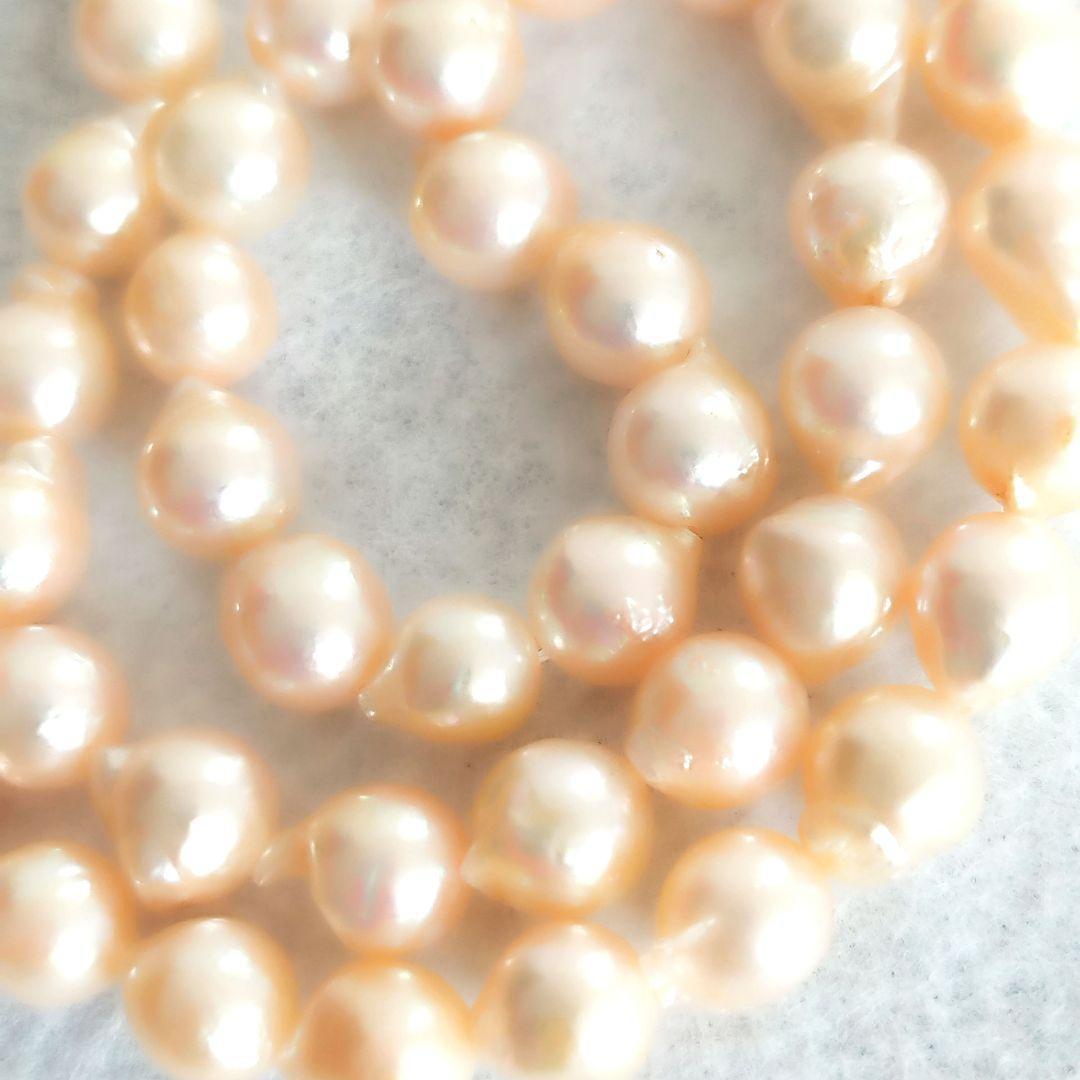 Akoya baroque pearl necklace in white with silver stamp, 42 cm length, displayed on a white background