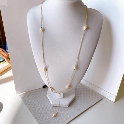 Akoya pearl baroque long Y-shaped necklace with 7mm pearls and gold granules on a 75cm chain