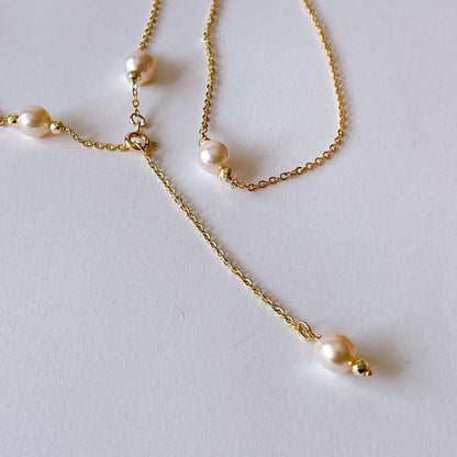 Akoya pearl baroque long Y-shaped necklace with 7mm pearls and gold granules on a 75cm chain
