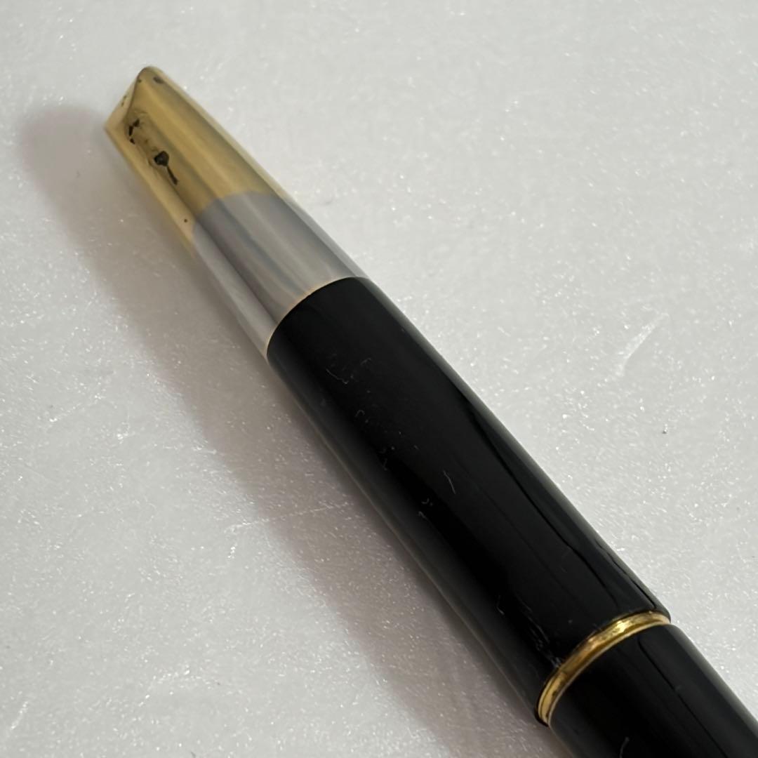 Used Pilot Capless Initial Model fountain pen with 14K gold nib, showing body crack and signs of wear