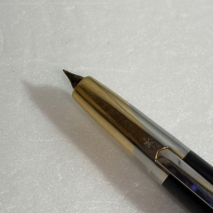Used Pilot Capless Initial Model fountain pen with 14K gold nib, showing body crack and signs of wear