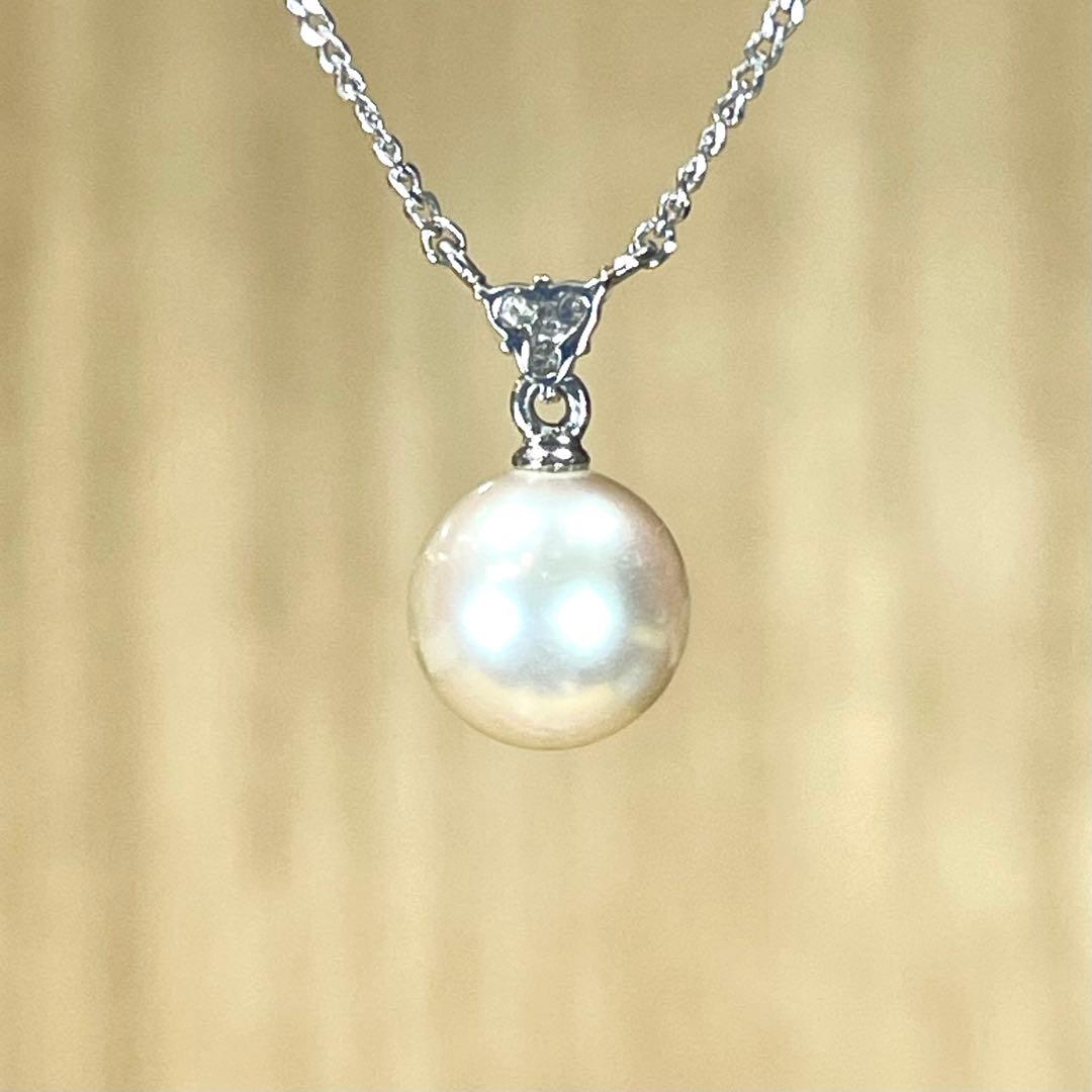 Tasaki Pt850 necklace featuring a 7.6mm Akoya pearl with three small diamonds total 0.04 ct
