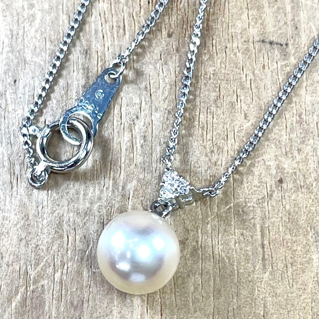 Tasaki Pt850 necklace featuring a 7.6mm Akoya pearl with three small diamonds total 0.04 ct