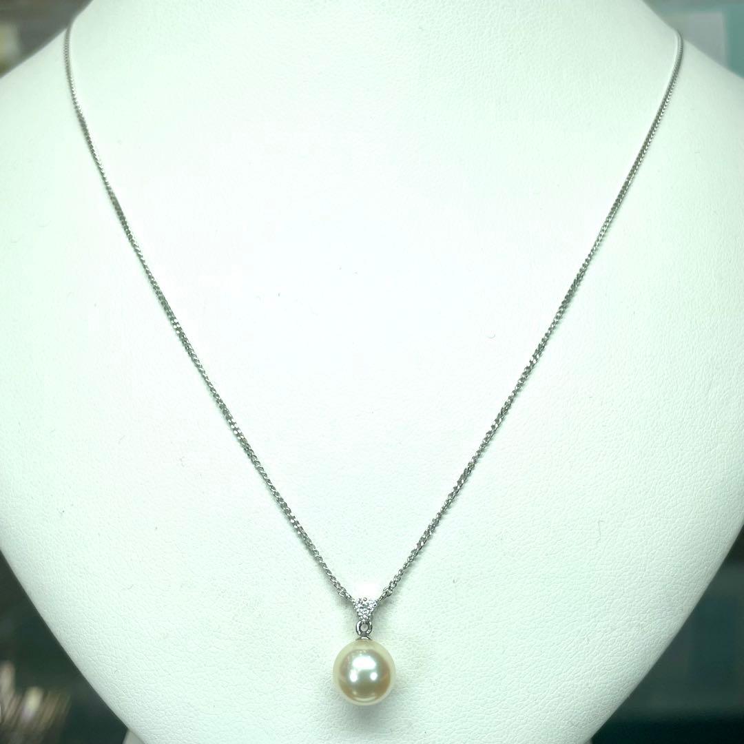 Tasaki Pt850 necklace featuring a 7.6mm Akoya pearl with three small diamonds total 0.04 ct