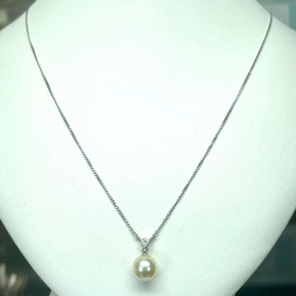 Tasaki Pt850 necklace featuring a 7.6mm Akoya pearl with three small diamonds total 0.04 ct