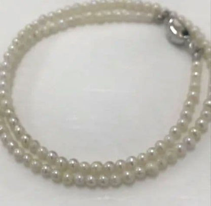 Akoya pearl baby necklace with small round pearls measuring 3.5 to 3.9mm on a 42cm chain