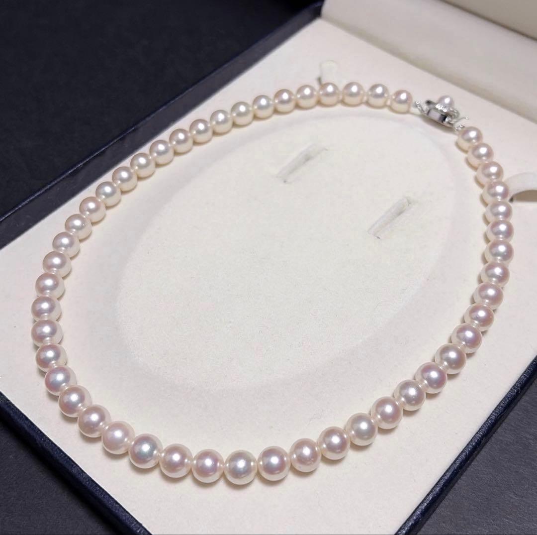 TASAKI Akoya Pearl Necklace with 8.0-8.5 mm pearls and 42 cm length displayed on a black background