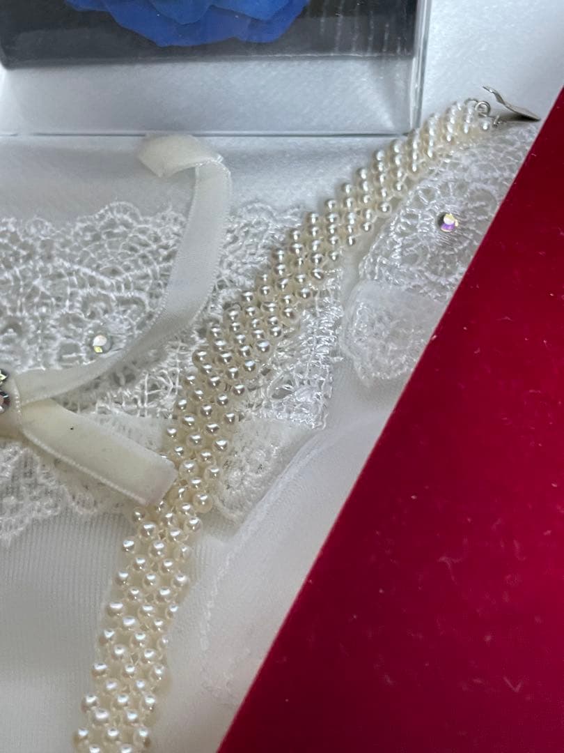 High-quality Aurora colored 5-row V-shaped Akoya pearl necklace with semi-round 3mm pearls and silver floral clasp