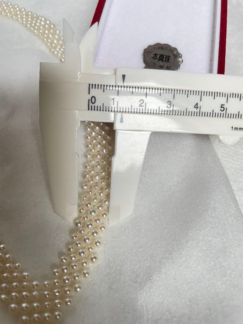 High-quality Aurora colored 5-row V-shaped Akoya pearl necklace with semi-round 3mm pearls and silver floral clasp