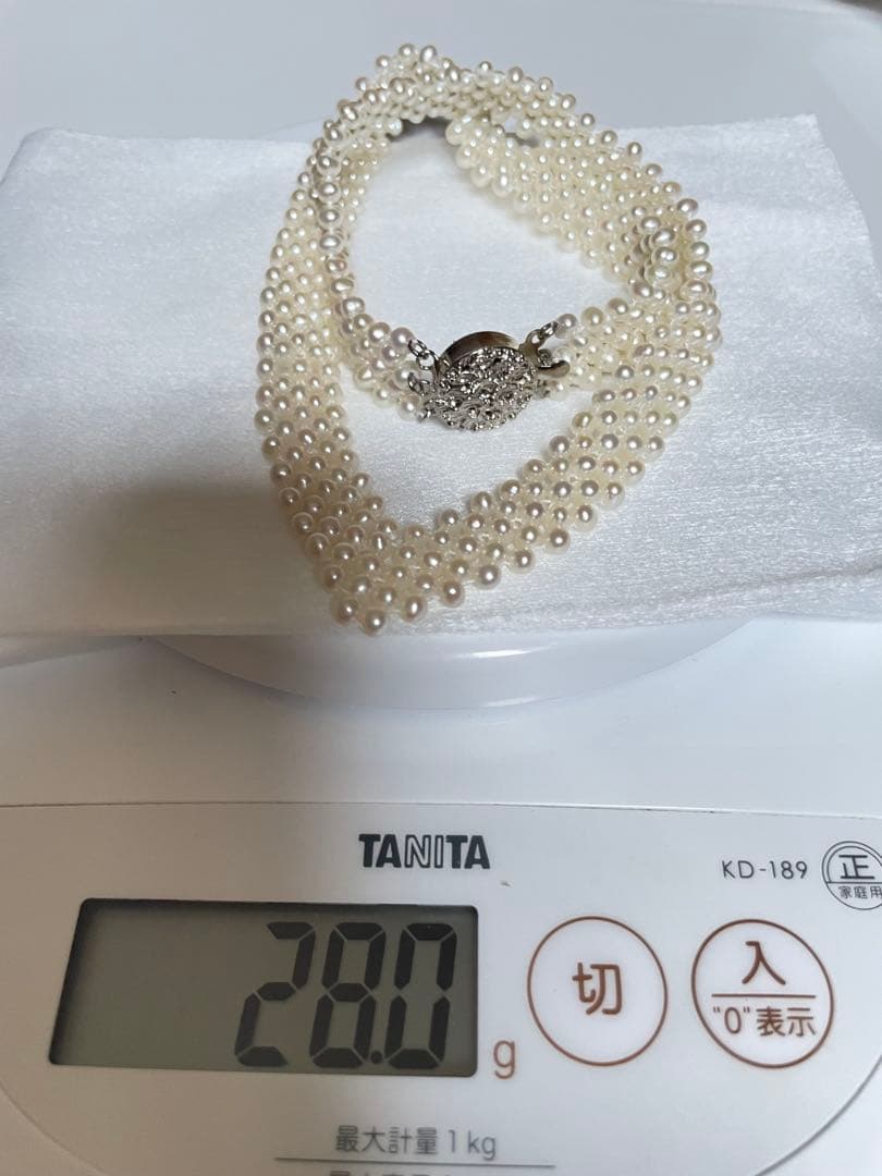High-quality Aurora colored 5-row V-shaped Akoya pearl necklace with semi-round 3mm pearls and silver floral clasp